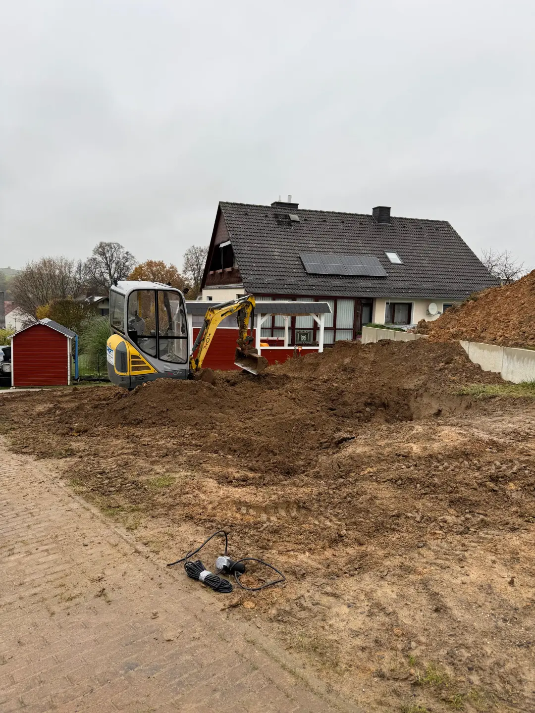 Erdabfuhr & Flächenplanierung